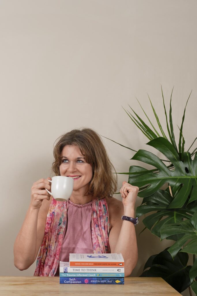 Portrait of Caroline Ross, women's health and mindset coach.